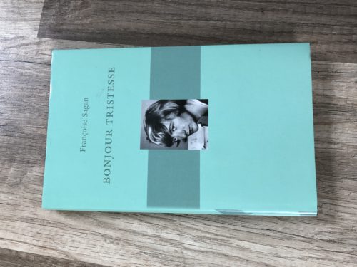 Grönt bokomslag med bild på författaren Françoise Sagan